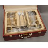 A set of Harrier gilded stainless steel cutlery.