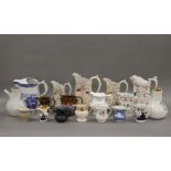 A collection of various 19th century porcelain jugs, etc.