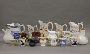 A collection of various 19th century porcelain jugs, etc.