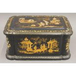 A 19th century chinoiserie lacquered box. 21 cm wide.