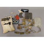 A quantity of military cap badges, buttons, etc.