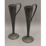 A pair of Art Nouveau pewter vases. 30 cm high.