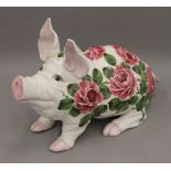 A Wemyss Ware Cabbage Roses pattern pig by Esther Weeks, stamped 1988. 43 cm long.