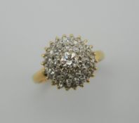 A vintage unmarked 18 ct gold (tested) diamond cluster ring. Ring size N/O.