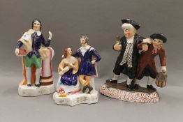 Three Staffordshire figurines; Drunken Parson and Curate, Robert Burns and another.