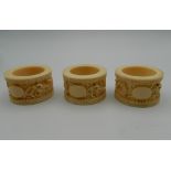 Three 19th century Canton ivory napkin rings