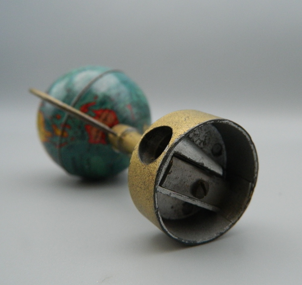 A vintage novelty pencil sharpener formed as a globe. 9 cm high. - Image 4 of 4