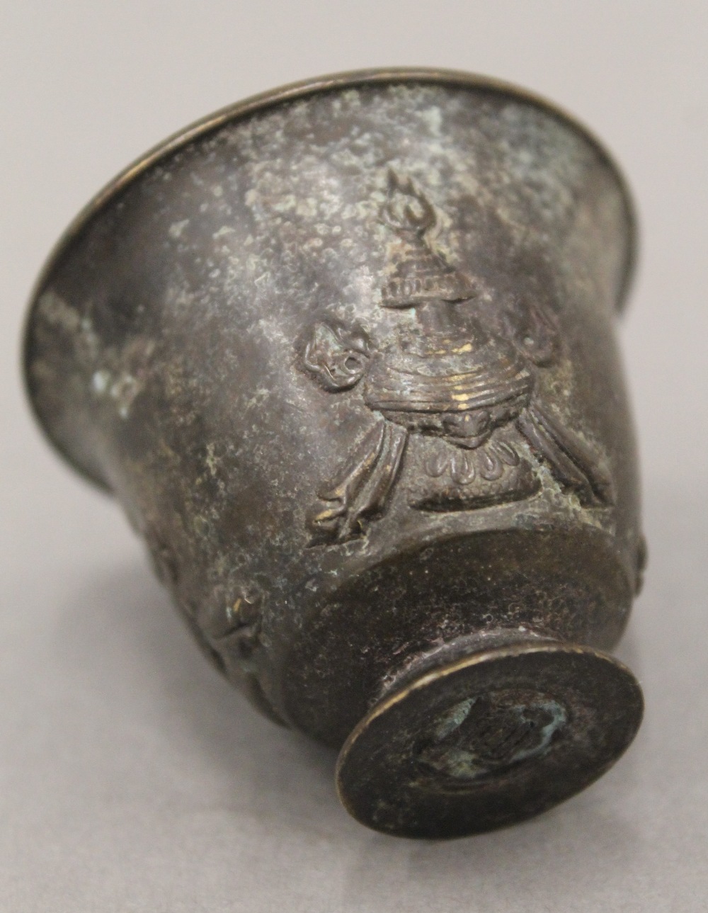 A small Chinese bronze cup. 4 cm high. - Image 3 of 3