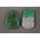 Two jade pendants. The largest 5 cm high.