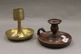 An early 19th century oak chamberstick with patinated bronze dog head handle together with a Trench