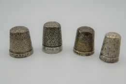 Four silver thimbles. 16.9 grammes.