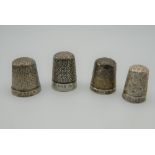 Four silver thimbles. 16.9 grammes.