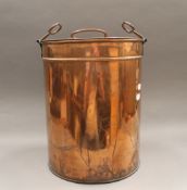 A large copper lidded urn. 44 cm high.