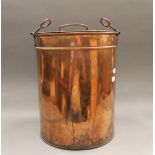A large copper lidded urn. 44 cm high.