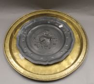 A large Persian tray with spray and star rim motif and central elephant and floral decoration;