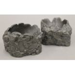 A pair of Victorian Britannia metal ashtrays, inscribed ''H Thomson from the Dame 8 Dec 1888''.
