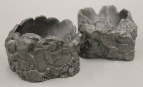 A pair of Victorian Britannia metal ashtrays, inscribed ''H Thomson from the Dame 8 Dec 1888''.