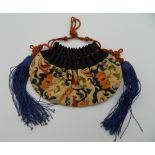 A Chinese embroidered purse. 13 cm wide.