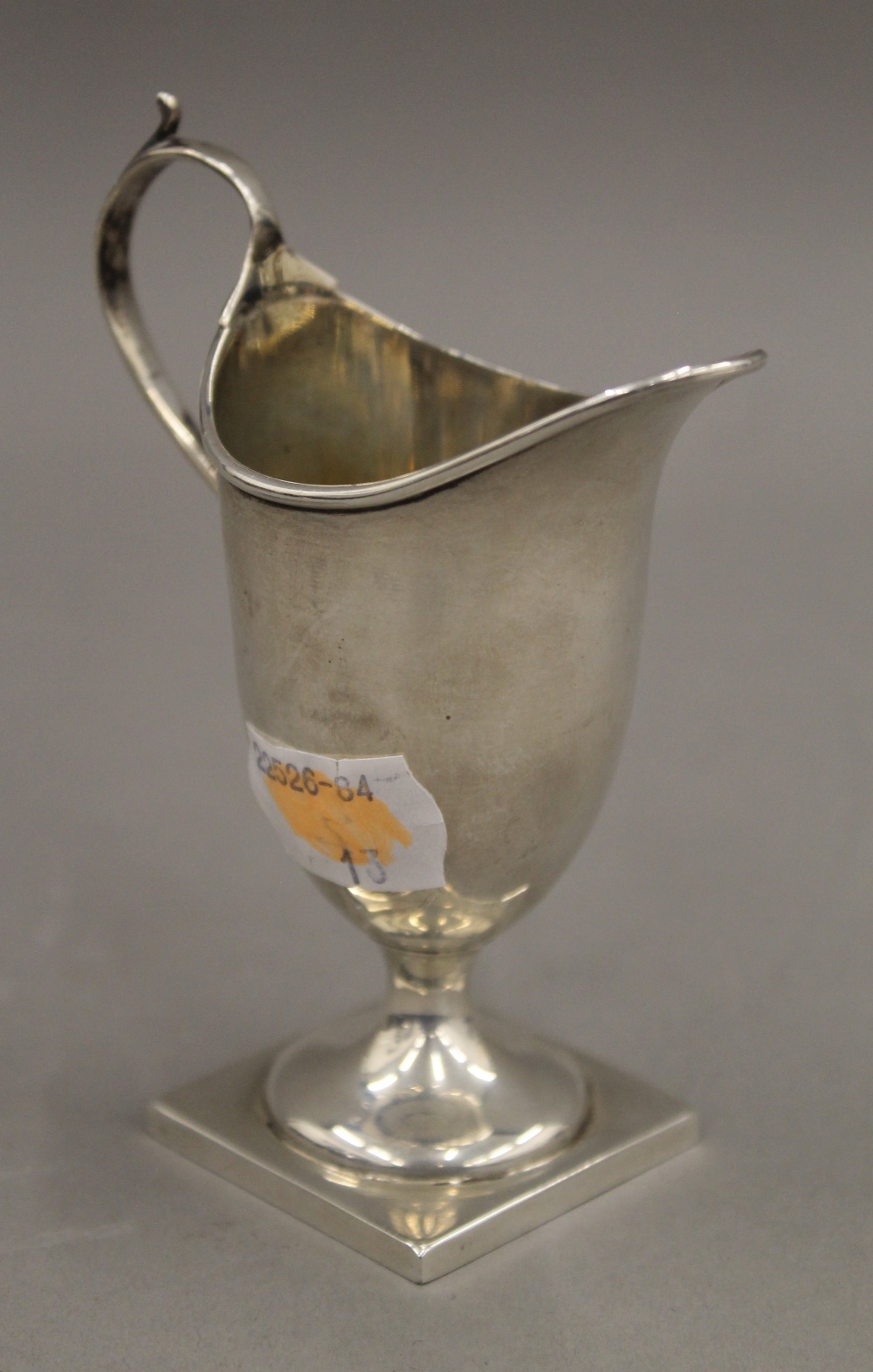 A silver cream jug. 10.5 cm high. 47 grammes.