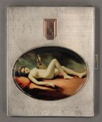 A silver cigarette case depicting a nude lady. 8.5 cm wide.