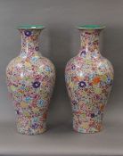 A pair of millefiori porcelain vases. 68 cm high.