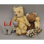 A collection of vintage cuddly toys. The largest 30 cm high.