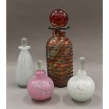 A Mdina glass decanter, signed; together with three perfume bottles with stoppers. The former 25.