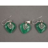 A pair silver mounted heart shaped earrings and matching pendant. The pendant 2 cm high.