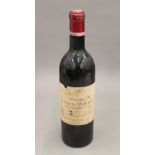 A single bottle of Chateau Lynch Moussas Grand Cru Classe 1959. 29 cm high.