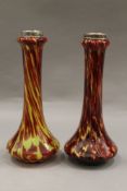 A pair of Victorian hand blown mottled glass vases with silver rims. 19 cm high.