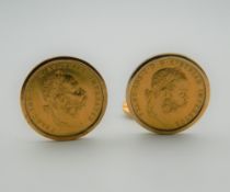 A pair of 14 ct gold and gold coin set cufflinks. 2 cm diameter. 15.5 grammes total weight.