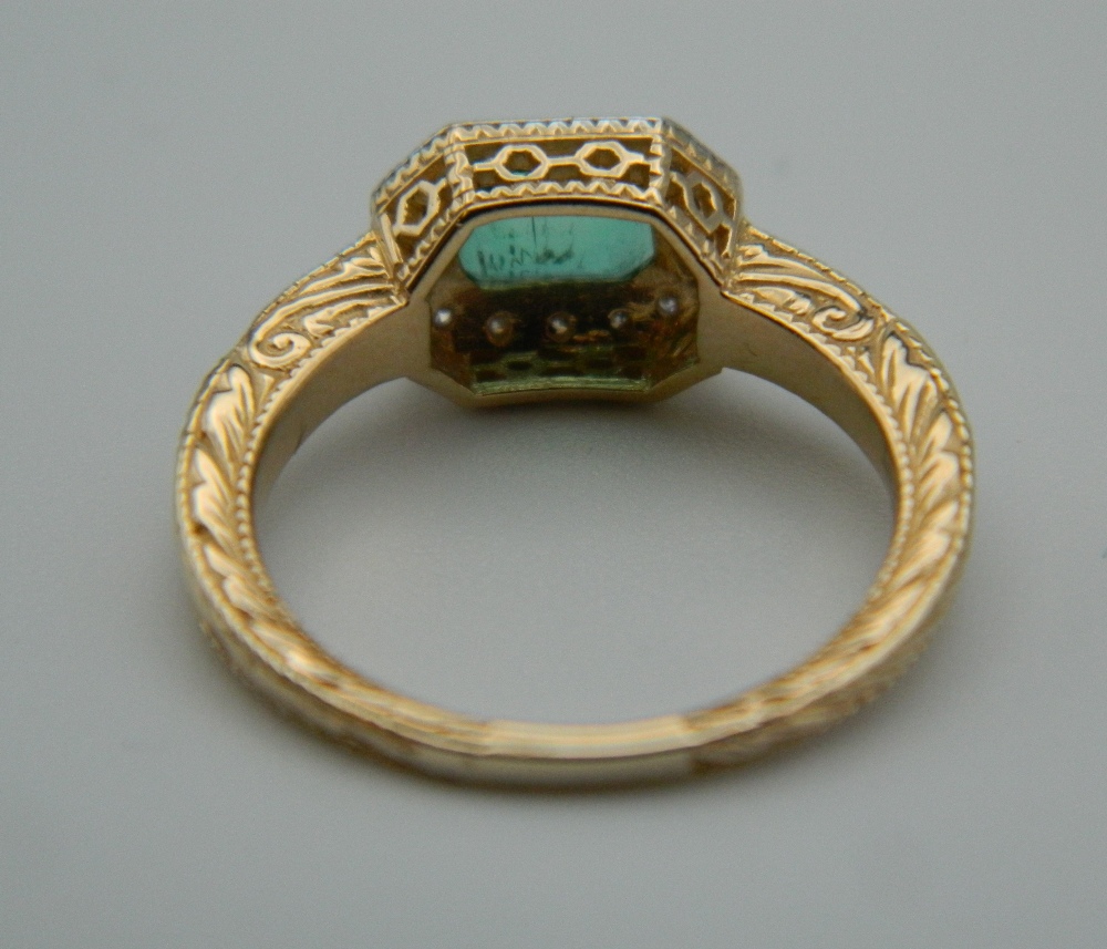 An Art Deco style 9 ct gold, emerald and diamond ring with diamond set shoulders and engraved shank. - Image 6 of 9