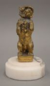 A 19th century gilded bronze figure of a dog, signed ''Meisner''. 9.5 cm high.