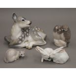 Four Copenhagen porcelain animals. The largest 15.5 cm long.