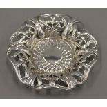 A small Art Nouveau silver dish, hallmarked for Chester. 10 cm diameter. 28.7 grammes.