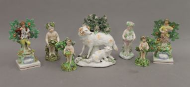 A collection of Staffordshire and other porcelain figures. The largest 15.5 cm high.