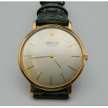 An 18 ct gold Rolex Ultra Slim dress watch with coin edge. 3.5 cm wide.