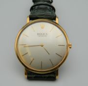 An 18 ct gold Rolex Ultra Slim dress watch with coin edge. 3.5 cm wide.