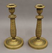 A pair of Empire style candlesticks. 22 cm high.