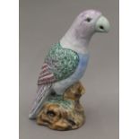 A pottery parrot. 24 cm high.