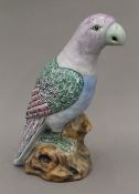 A pottery parrot. 24 cm high.