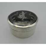 A Siamese silver Niello trinket box. 7 cm diameter. 102.5 grammes.