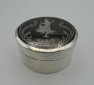 A Siamese silver Niello trinket box. 7 cm diameter. 102.5 grammes.