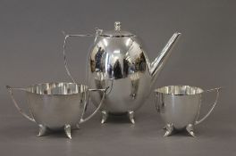 An Art Deco style silver plated tea set. 17 cm high.