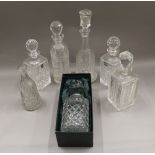 A quantity of cut crystal decanters, etc.