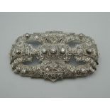 An Art Deco platinum diamond brooch. 7 cm wide. 21.7 grammes total weight.