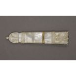 A 19th century mother-of-pearl needle case formed as a quiver of arrows. 9.5 cm long.