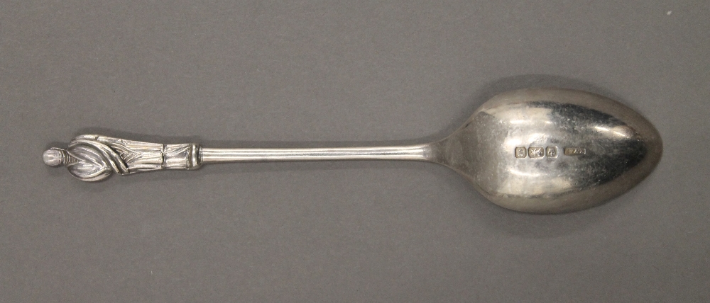 A cased set of silver apostle teaspoons and tongs. 3.2 troy ounces. - Image 5 of 10