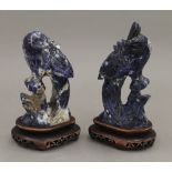A pair of Chinese carved lapis carved birds, on stands. The largest 16 cm high overall.