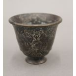 A small Chinese bronze cup. 4 cm high.